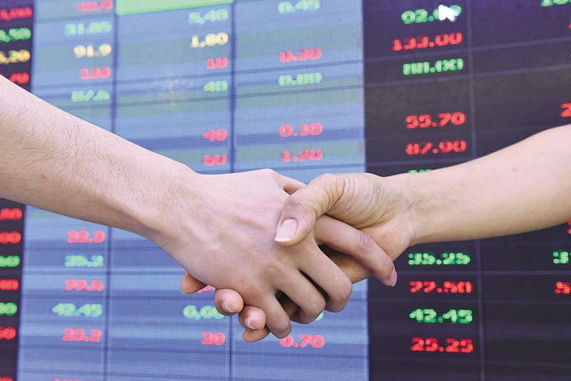 Ngân hàng đổ bộ vào lĩnh vực chứng khoán thông qua M&A 2 34