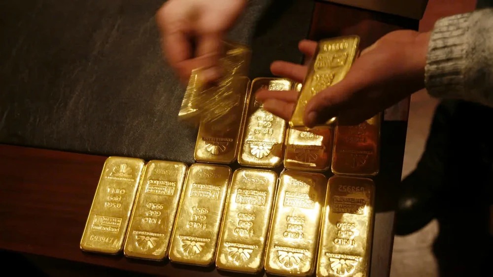 Giá vàng giảm gần 5% trong tuần sau chiến thắng của Trump, đạt mức 2.566,7 USD/ounce 3 giá vàng