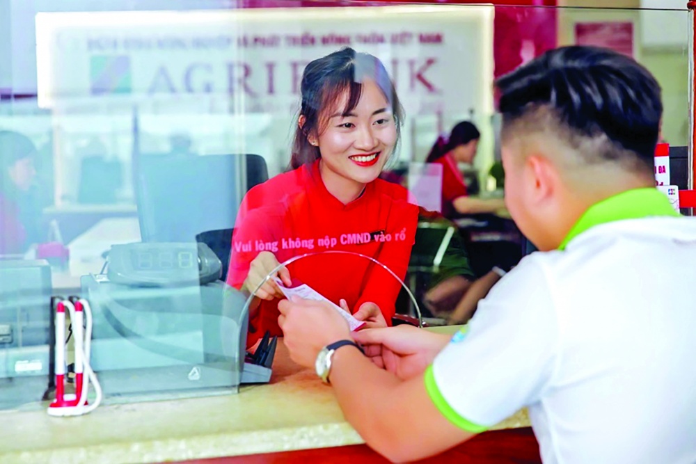 Ngân hàng đẩy mạnh tín dụng, hỗ trợ tăng trưởng kinh tế 2025 2 Ngân hàng Agribank
