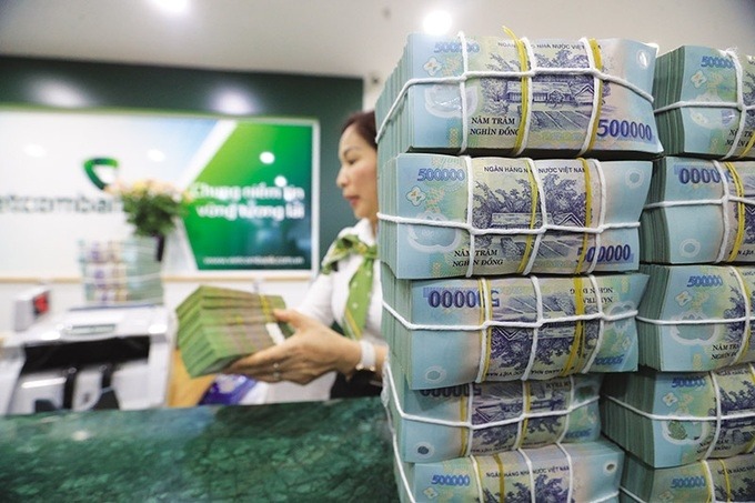 Lợi nhuận ngân hàng 2025 tăng mạnh nhờ tín dụng 2 Vietcombank đặt kế hoạch lợi nhuận trước thuế 44.300 tỷ đồng, tăng 5%, cùng tăng trưởng tín dụng 16,28% và nợ xấu duy trì dưới 1,5%.